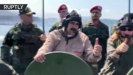 Maduro rides amphibious tank jogs alongside soldiers ahead of military drills