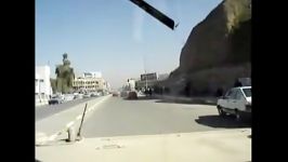 Hummer driving in traffic in Baghdad