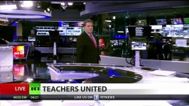 Gesture of solidarity as teachers strike worldwide