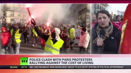 French protesters clash with police in rally over minimum wage