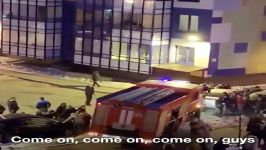 People drag cars out of the way of firetruck responding to emergency