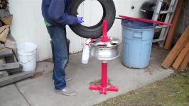 Mounting a rally tire with a harbor freight manual tire changer.