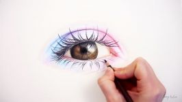 Drawing a realistic colorful eye with colored pencils on toned paper