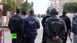 Protests grip Tunisia after journalist sets himself on fire over country