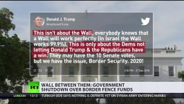 Wall between them US govt shutdown enters day seven