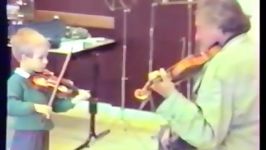 Le grand violoniste IVRY GITLIS avec les petits enfants