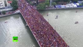 Thousands of devotees join massive Black Nazarene procession in the Philippines