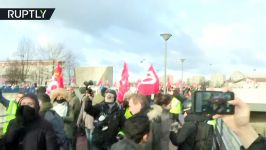 Anti Macron protest met with tear gas in Paris