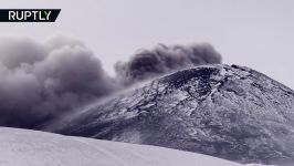 Italys mount Etna emitting volcanic ash