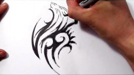 How To Draw a Wolf Incorporated Into a Tribal Tattoo Design