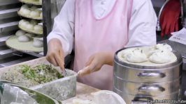 غذاهای خیابانیKorea Street Food. Filling Mandu Dumplings at Gwangjan