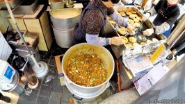 غذاهای خیبانیFilling and Frying Hotteok Pancakes. Korea Street Food in l