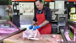 Stuffed Fat Pork Belly the Italian Way. Preparing Porchetta