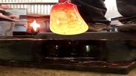 هنر شیشه گری  Glass artists from Asp and Hand blowing in a wooden blow mold.