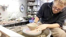 هنر سفال گری  Trimming some small pottery bowls