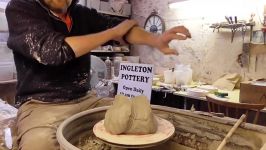 هنر سفال گری  Making Throwing a Tall Neck Pottery Vase on the Wheel.