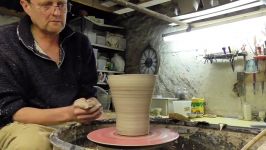 هنر سفال گری  Un Throwing Making a Clay Pot on the Pottery Wheel.