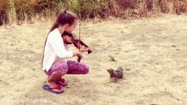 Karolina protsenko is playing violin for little squirrel