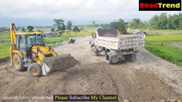 dssminer.com Backhoe loading Gravel in Tipper