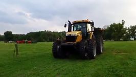 Cat tractor pulling a steam engine