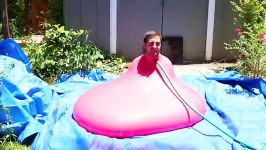 6ft Man in 6ft Giant Water Balloon  4K  Slow Motion