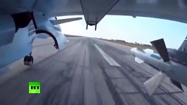 Wing mounted cam shows Su 30 and Su 25 jets dropping bo