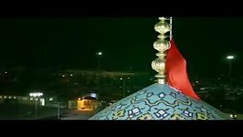 اهتزاز پرچم حسینی بر فراز گنبد فیروزه ای مسجد جمکران