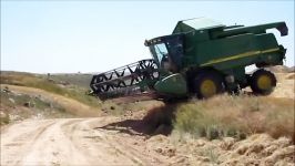 JOHN DEERE COMBINE JUMPING