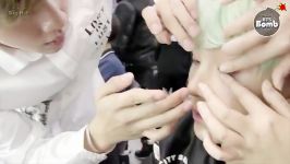 BANGTAN BOMB SUGA is trying to wear contact lenses