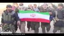 پرچم ایران اسلامی در دست مدافعان حرم در نبل الزهرا