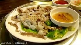 منوی چندش آور حال بهم زن خوردن اختاپوس زنده در چین