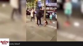 A man beating his wife on public place Terrified Toddle