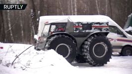 Off road monster Russian all terrain vehicle drives across ice and into water to save lives