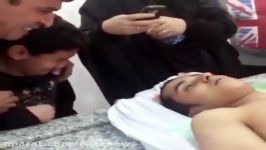 حضور خانواده مداح شهید بحرینی کنار جسد مطهر فرزندشان