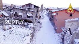 Italy Drone captures first snow of the year over quake damaged Amatrice