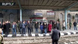 Syrians seen smiling and excited as train travels through Aleppo for first time in over four years