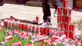 Crashing through 200 Coke Cans  The Slow Mo Guys