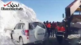 فیلم خارج کردن خودروی پلیس زیر بهمن محور هراز