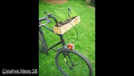 طراحی باغچه دوچرخه تزیین شده گلدان