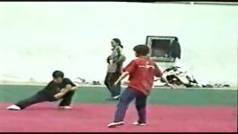 ووشو ، تمرین حرکات پایه ووشو تیم چین در شهر خانجو سال 2003