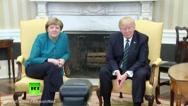 Weird moment Trump ignores media prompts to shake hands with Merkel