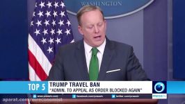 White House vows to appeal rulings blocking new travel ban