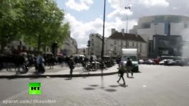 ‘Smoke grenades’ fly as protesters rally against Macron Le Pen in Paris