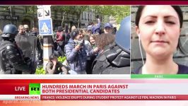 Neither Macron nor Le Pen Protesters march against French presidential candidates in Paris