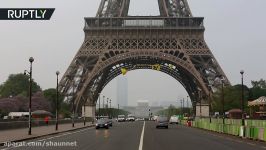 Liberty Equality Fraternity Greenpeace unravel anti Le Pen banner on Eiffel Tower