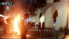 RAW Man in wheelchair knocked over by police vehicle during Rio protests