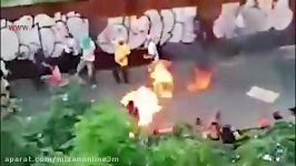 به آتش کشیدن مرد مظنون به دزدی در میان تظاهرکنندگان