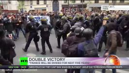 France divided Emmanuel Macron takes office amid protests