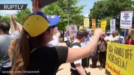 Pro and anti Maduro protesters face off as OAS foreign ministers discuss Venezuela