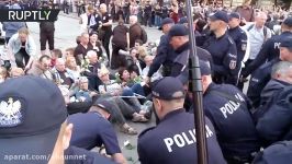 Polish police forcibly remove anti govt protesters blocking 2010 plane crash memoration march